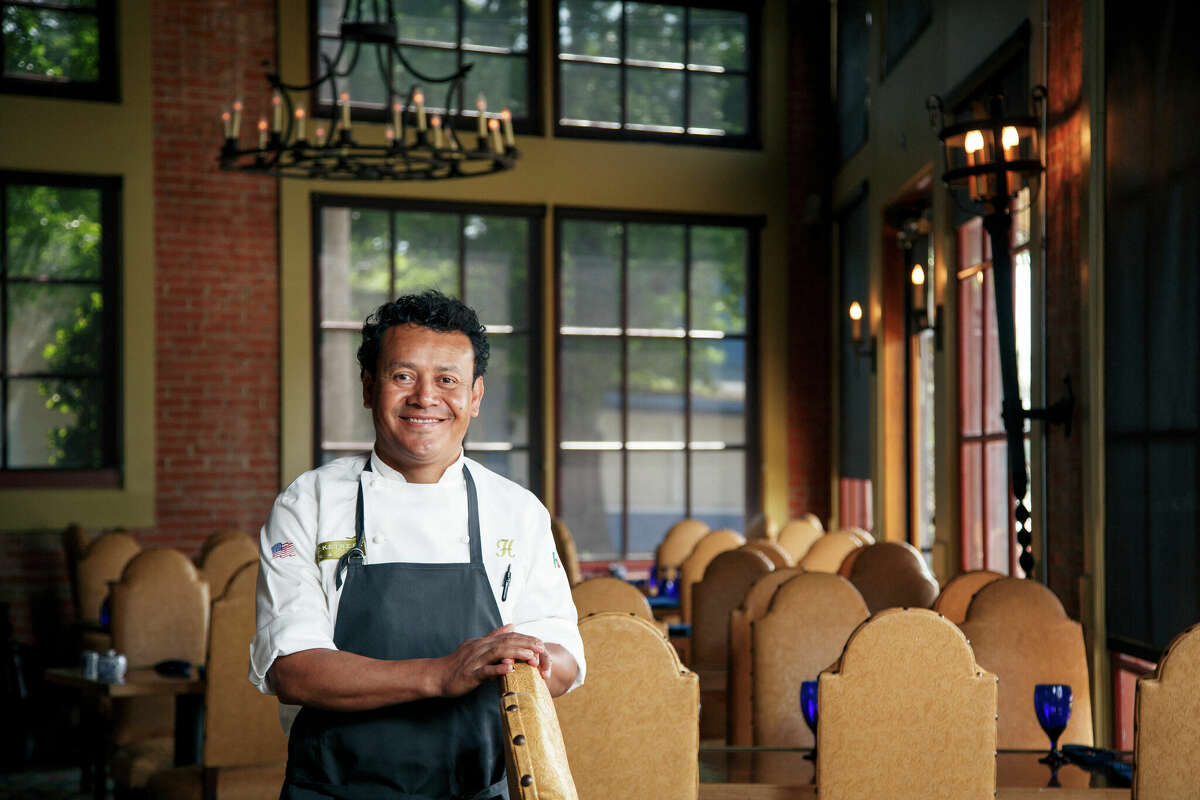 Chef Hugo Ortega poses for a photo in his restaurant Hugo's Restaurant, Monday, April 15, 2013, in Houston. Ortega is a nominee for best chef Southwest for the 2013 James Beard Foundation awards on May 6. ( Michael Paulsen / Houston Chronicle )