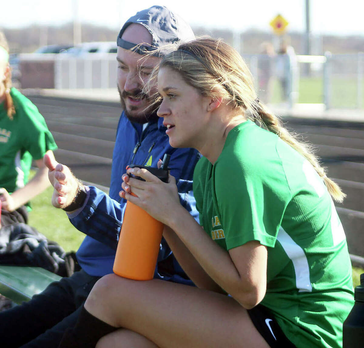 Southwestern coach Tyler Hamilton talks with player Mac Day during a game last season. Hamilton is The Telegraph Small Schools Girls Soccer Coach of the Year and Day is the Player of the Year.