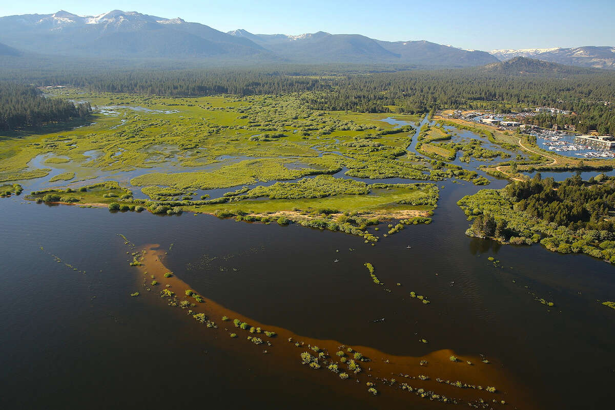 An aerial photo of flooded marshland in 2017. This scene will become more common now that restoration efforts have sought to reclaim and heal wetland damaged by developers.