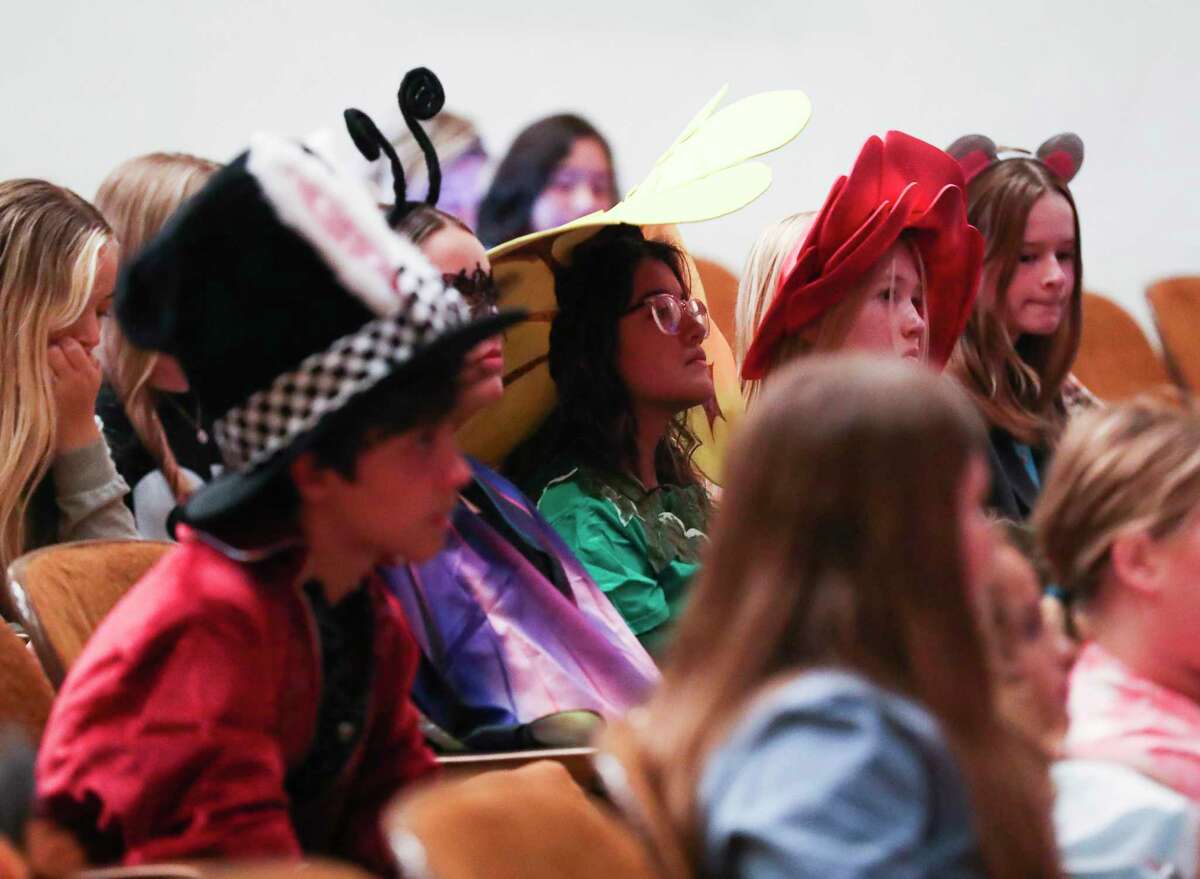 Campers listen during the annual Crighton Summer Camp at the Crighton Theatre, Wednesday, July 27, 2022, in Conroe. After rehearsing all summer, campers will hold their season ending show "Alice in Wonderland" Aug. 4-7.