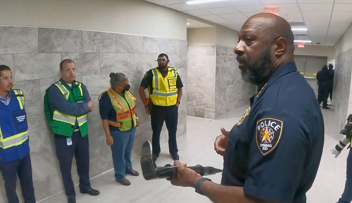 In this screenshot of a video provided by the school district, Spring ISD Police Chief Ken Culbreath talks to employees during an active shooter drill and training exercise Thursday, July 28, 2022.