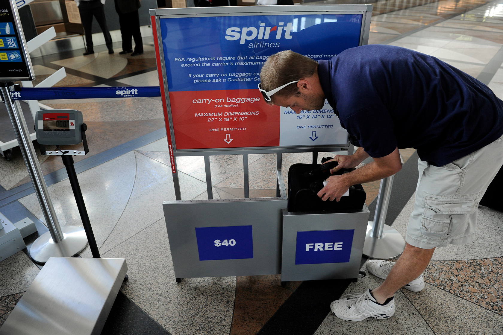 What is Spirit Airlines carry-on bag size limit?