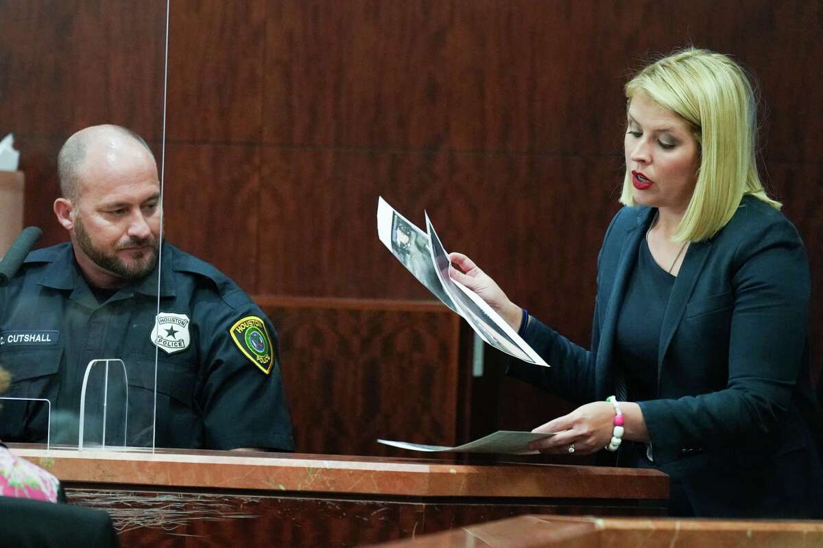 Houston Police officer Chris Cutshall is questioned by prosecutor Sarah Seely as he testifies in the trial against Robert Soliz Tuesday, July 26, 2022 in Houston. Soliz is accused of killing HPD Sgt. Sean Rios in November 2020.