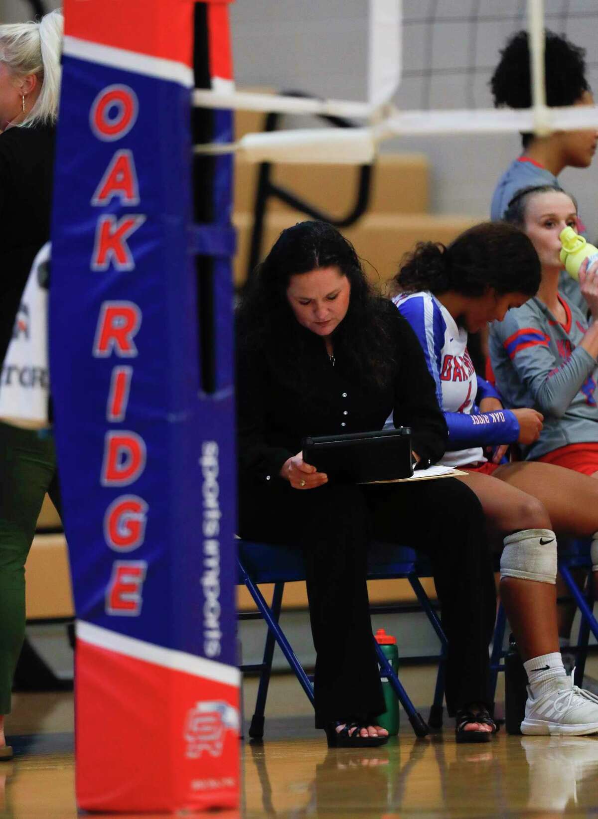 Oak Ridge head coach Tommie Lynne Sledge is seen between sets during a non-district high school volleyball match at Oak Ridge High School, Tuesday, Aug. 17, 2021.