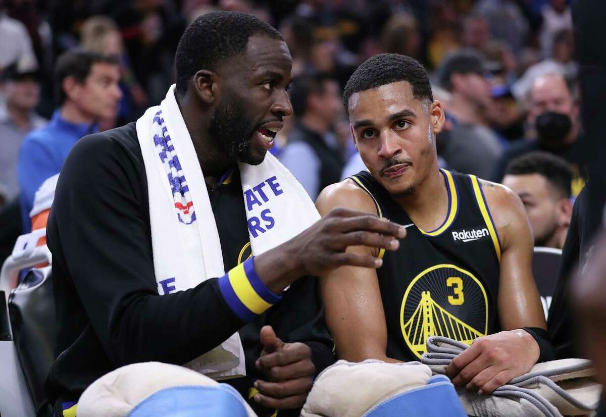 Draymond Green (left) is eligible for an extension, but the Warriors also will have to make a contract decision on Jordan Poole (right).