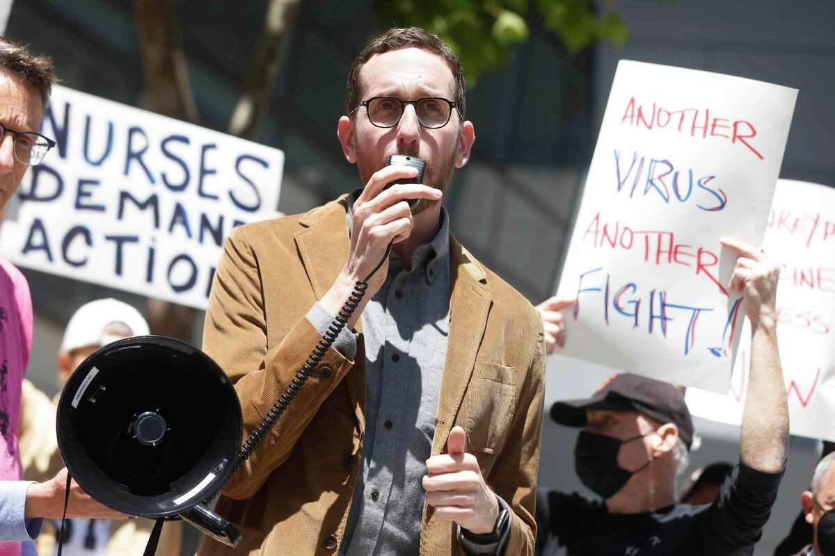 Sen. Scott Wiener speaks at a demonstration outside the San Francisco Federal Building urging the U.S. Department of Health and Human Services to step up distribution of the monkeypox vaccine on July 18, 2022, in San Francisco, Calif.