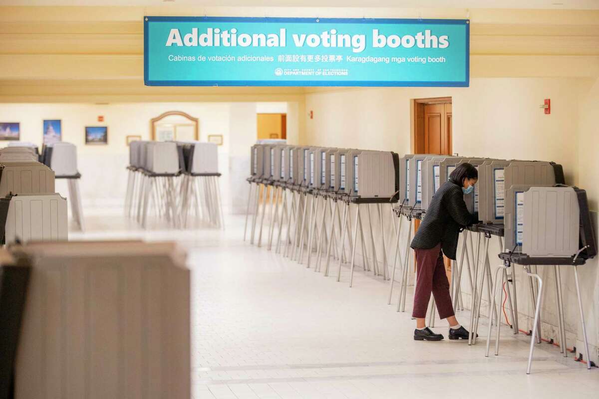 Voters cast ballots in a San Francisco school board recall election on Feb. 15, 2022. An appellate court put on hold a ruling that found a city ordinance allowing noncitizen parents to vote in school board elections unconstitutional.