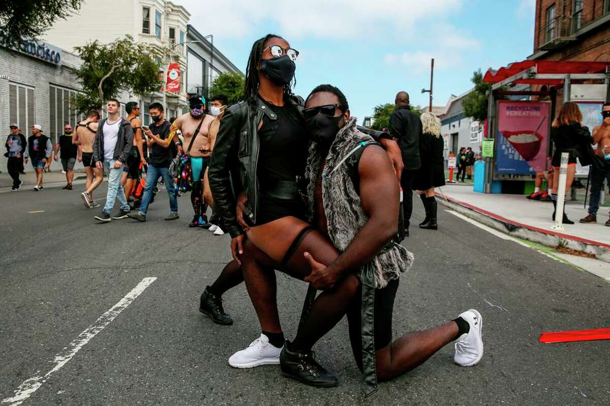 Cece and Jeff attend last year’s Folsom Street Fair, organized by the group putting on the Up Your Alley fair this weekend.