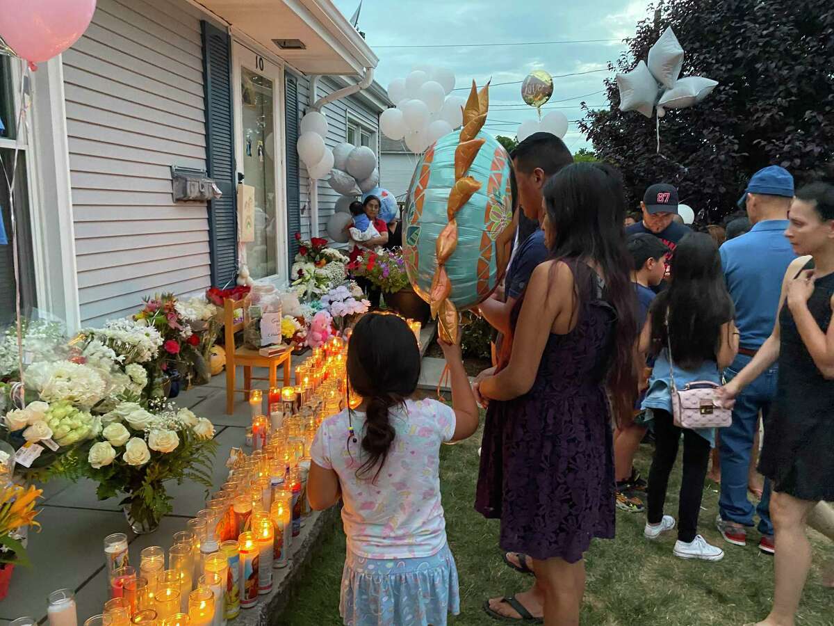 Dozens of people gathered on Whaley Street Friday night to mourn three children and a mother who died earlier this week. Danbury police say Sonia Loja, 36, killed her three children — 12-year-old Junior Panjon, 10-year-old Joselyn Panjon and 5-year-old Jonael Panjon — before taking her own life Wednesday.