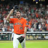 Houston Astros starting pitcher Justin Verlander (35) tips his cap to the crowd as he was pulled by manager Dusty Baker Jr. after Seattle Mariners' Julio Rodriguez's RBI double during the eighth inning of an MLB baseball game at Minute Maid Park on Friday, July 29, 2022 in Houston.