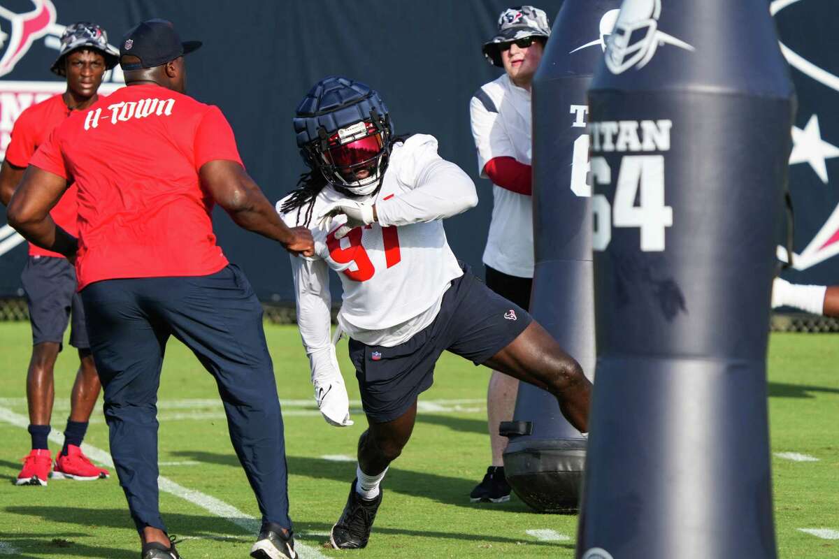 Houston Texans defensive lineman Mario Addison (97) ruins a drill during an NFL training camp Saturday, July 30, 2022, in Houston.