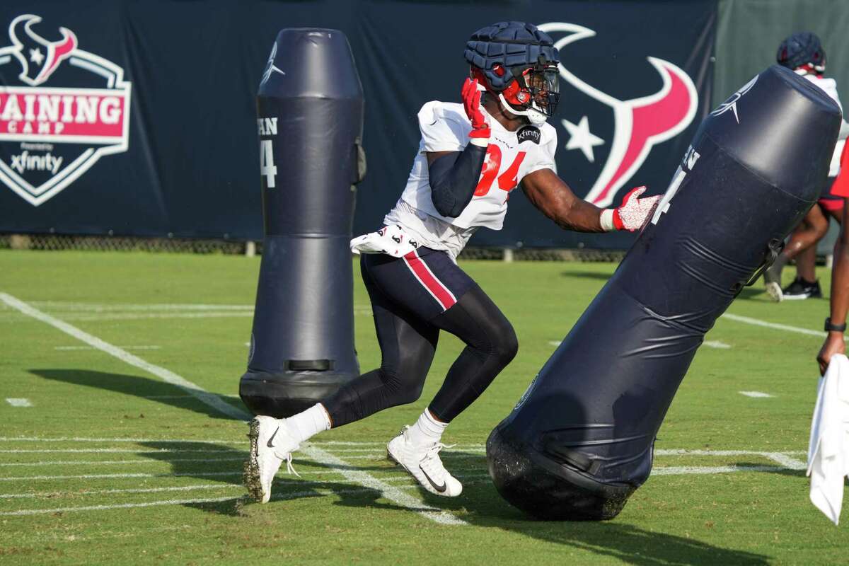 Houston Texans defensive lineman Demone Harris (94) runs a pass rush drill during an NFL training camp Saturday, July 30, 2022, in Houston.