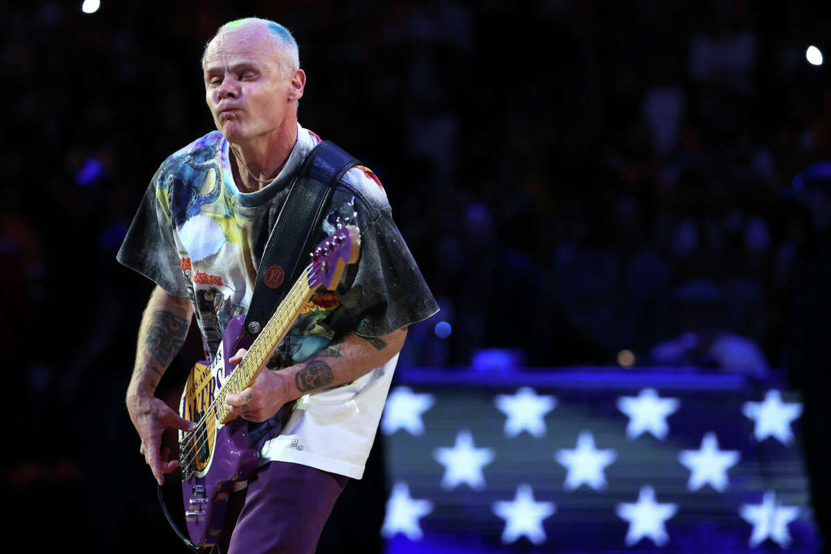 Bass player Flea of the band The Red Hot Chili Peppers plays the national anthem prior to a game between the Los Angeles Lakers and the Denver Nuggets at Crypto.com Arena on April 03, 2022 in Los Angeles, California.