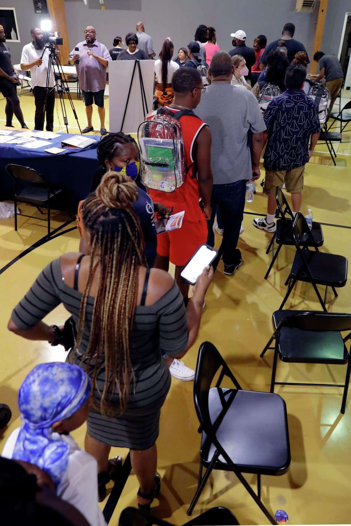 Attendees in line during a Harris County event where public defenders help misdemeanor offenders apply to have their convictions sealed or expunged, held at Victory International Chursh Saturday, Jul. 30, 2022 in Houston, TX.