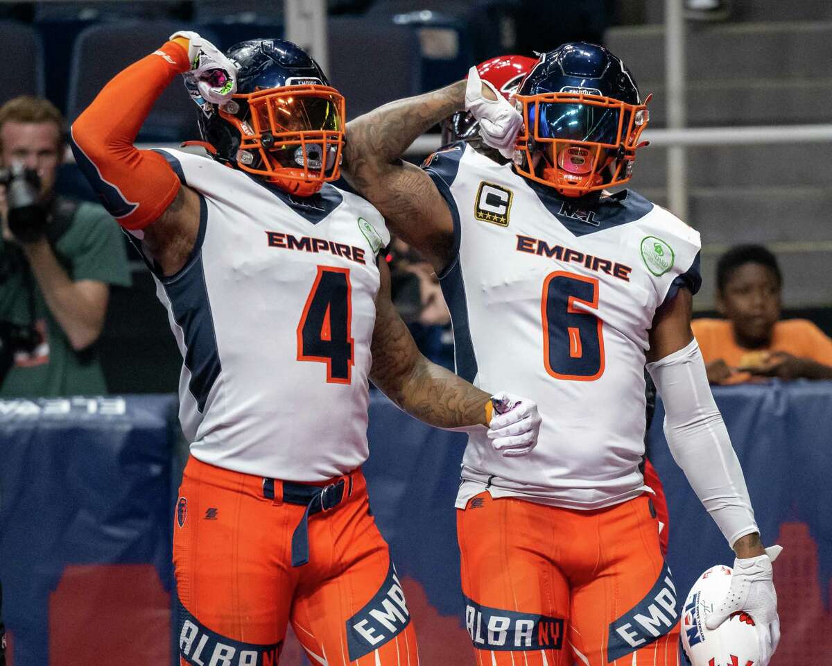 Albany Empire linebacker Trevon Shorts, left, and receiver Darius Prince celebrate a touchdown during the National Arena League playoffs against the Jacksonville Sharks. Prince and Shorts both earned all-NAL first-team nods.