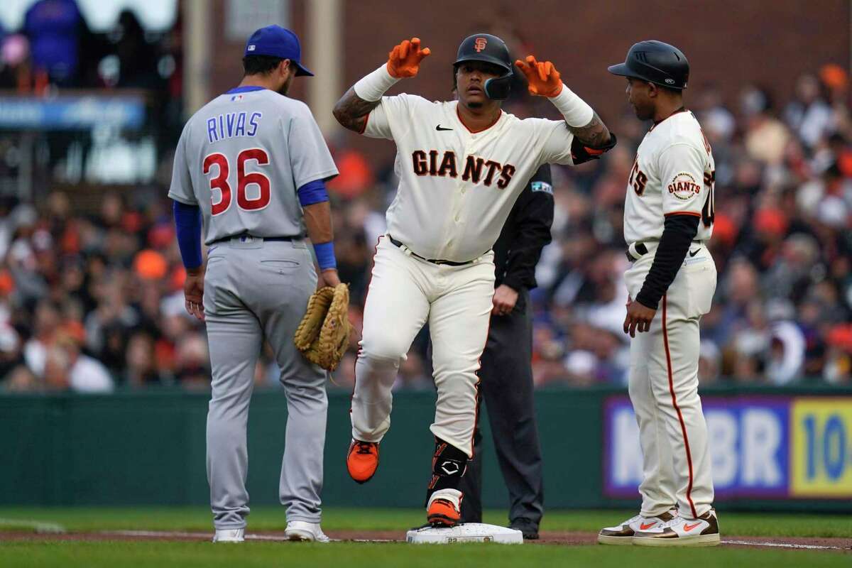 San Francisco Giants' Yermín Mercedes (6) celebrates after hitting a single against the Chicago Cubs during the first inning of a baseball game in San Francisco, Saturday, July 30, 2022. (AP Photo/Godofredo A. Vásquez)