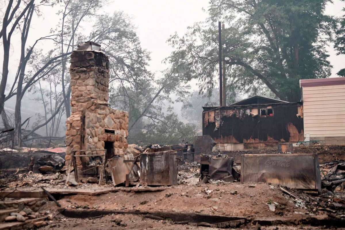 A structure in Klamath River, Calif., is seen destroyed by the McKinney Fire, Saturday, July 30, 2022. (Scott Stoddard/Grants Pass Daily Courier via AP)