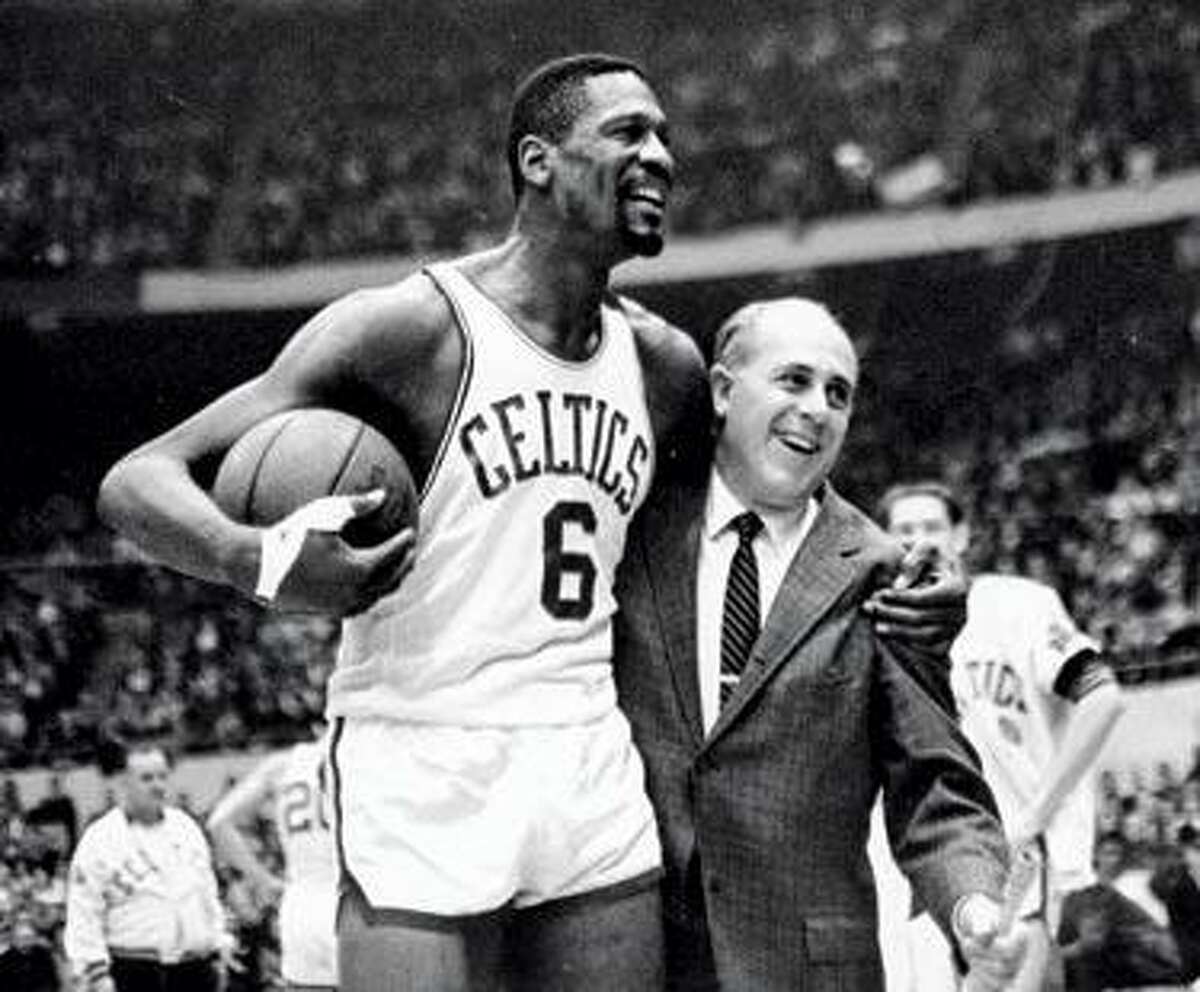 Boston Celtics' Bill Russell with coach Red Auerbach.