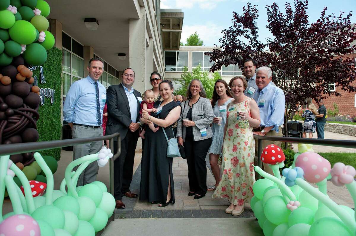 The Jewish Community Foundation hosted a Life and Legacy Year One Community Celebration, on June 12, to honor and thank partners and donors. Pictured here at the celebration are, from left, Jason Kay, Rabbi Tuvia Brander, Arielle Kay, Elisabeth Kostin, Lauren Benthien, Jillian Feldman, Joshua Feldman, Kathryn Gonnerman and Walt Harrison.