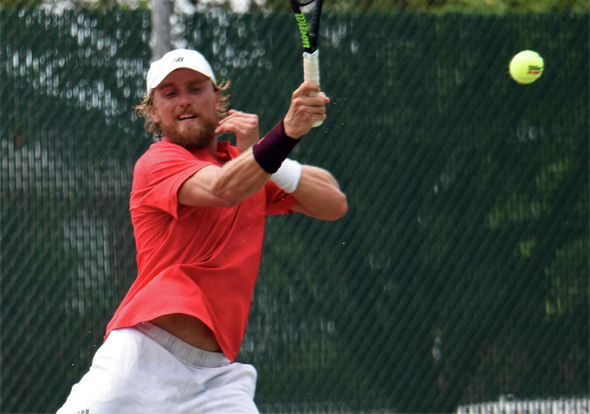 Action from the USTA Edwardsville Futures singles championship match between James Kent Trotter and Nathan Bonwith on Sunday at the EHS Tennis Center in Edwardsville. Trotter won in three sets to win the singles championship.