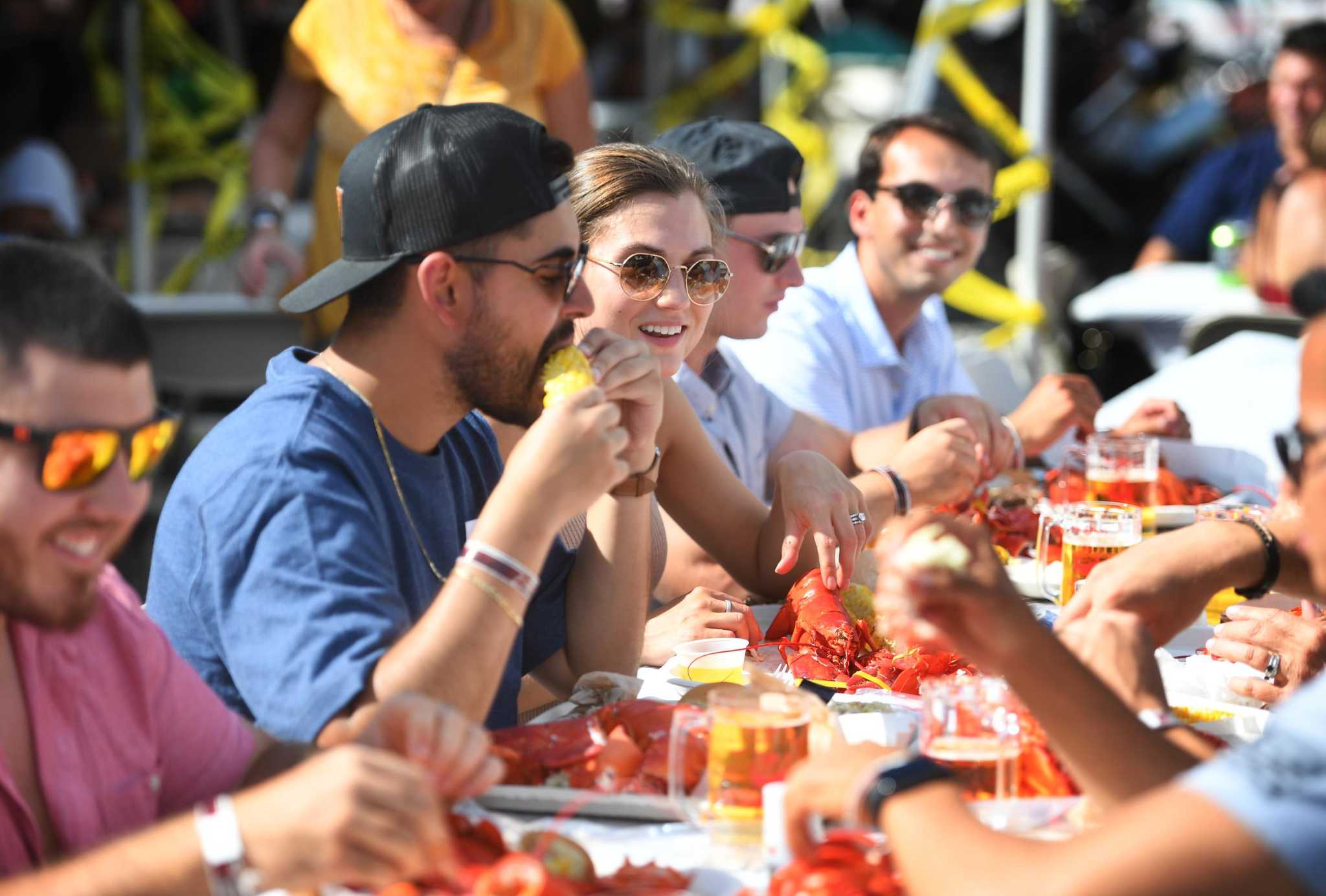 Photos Cracking claws a the Milford Rotary Lobster Bake