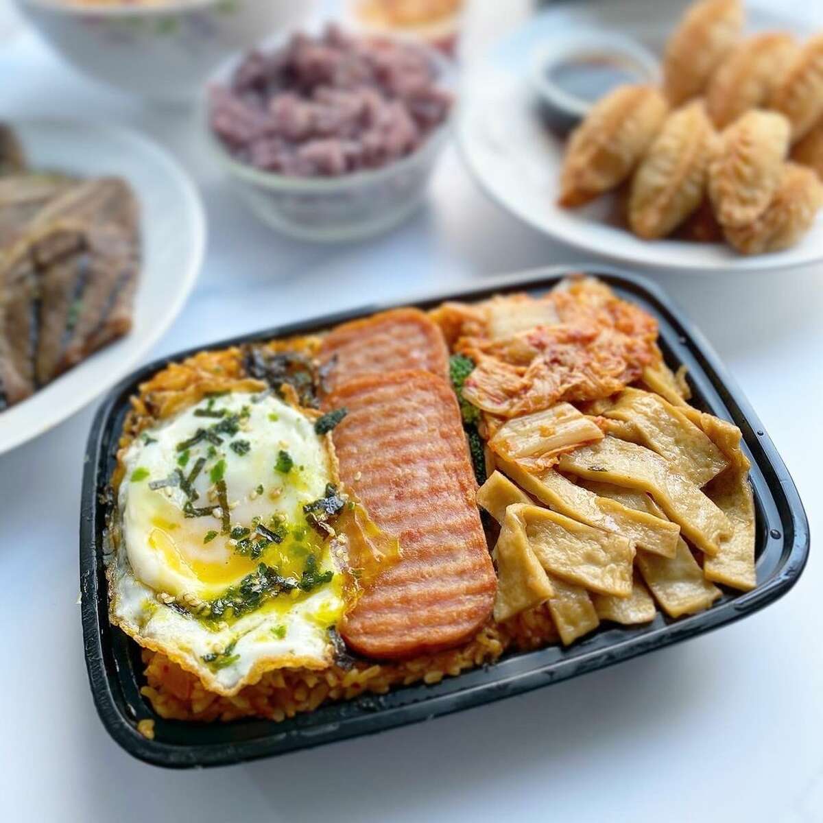 A Dosirak lunch box with spam and fried egg over rice is served at the Lucky Pig in San Francisco. 