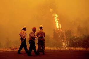 Firefighters near full containment of California’s biggest and deadliest fire of the year