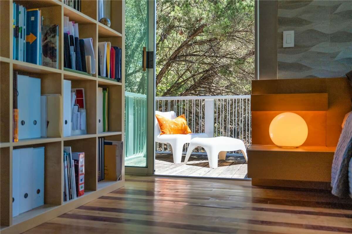 The 1,638 square foot home has two bedrooms, two baths, panoramic decks and patios with long-distance views on all four sides.