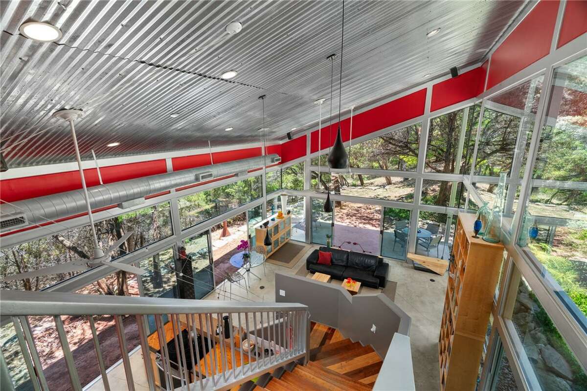 The 1,638 square foot home has two bedrooms, two baths, panoramic decks and patios with long-distance views on all four sides.