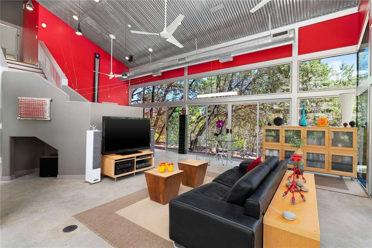 The 1,638 square foot home has two bedrooms, two baths, panoramic decks and patios with long-distance views on all four sides.