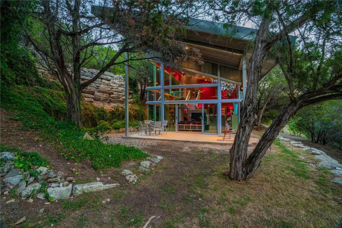 The 1,638 square foot home has two bedrooms, two baths, panoramic decks and patios with long-distance views on all four sides.