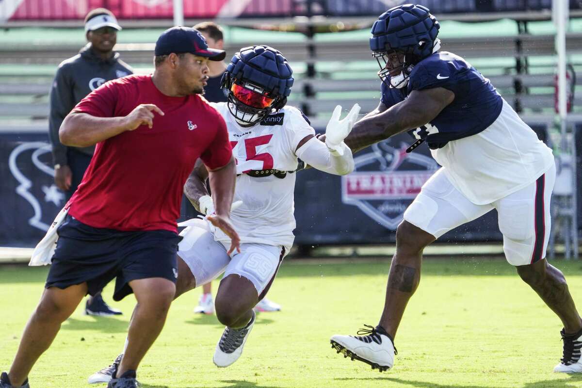 Veteran defensive end Jerry Hughes (55), signed to improve the Texans' pass rush, showed in Tuesday's practice he can still get to the quarterback.