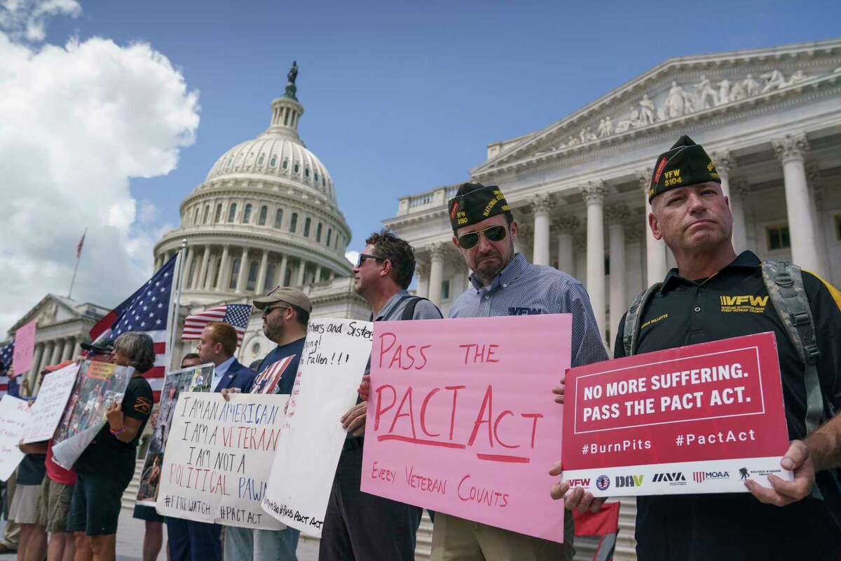 Veterans, military family members and advocates call for Senate Republicans to change their votes on a bill designed to help millions of veterans exposed to toxic substances during their military service, on the steps of the Capitol in Washington, Monday, Aug. 1, 2021. (AP Photo/J. Scott Applewhite)