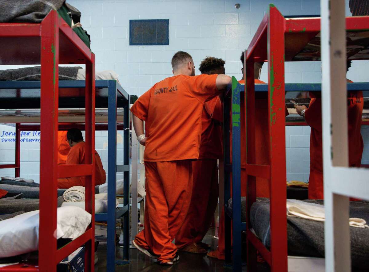 Two people died at the Harris County Jail between Oct. 1 and Oct. 2, 2022. In this file photo, inmates are seen inside the Harris County Jail on Thursday, Jan. 14, 2021, in Houston.