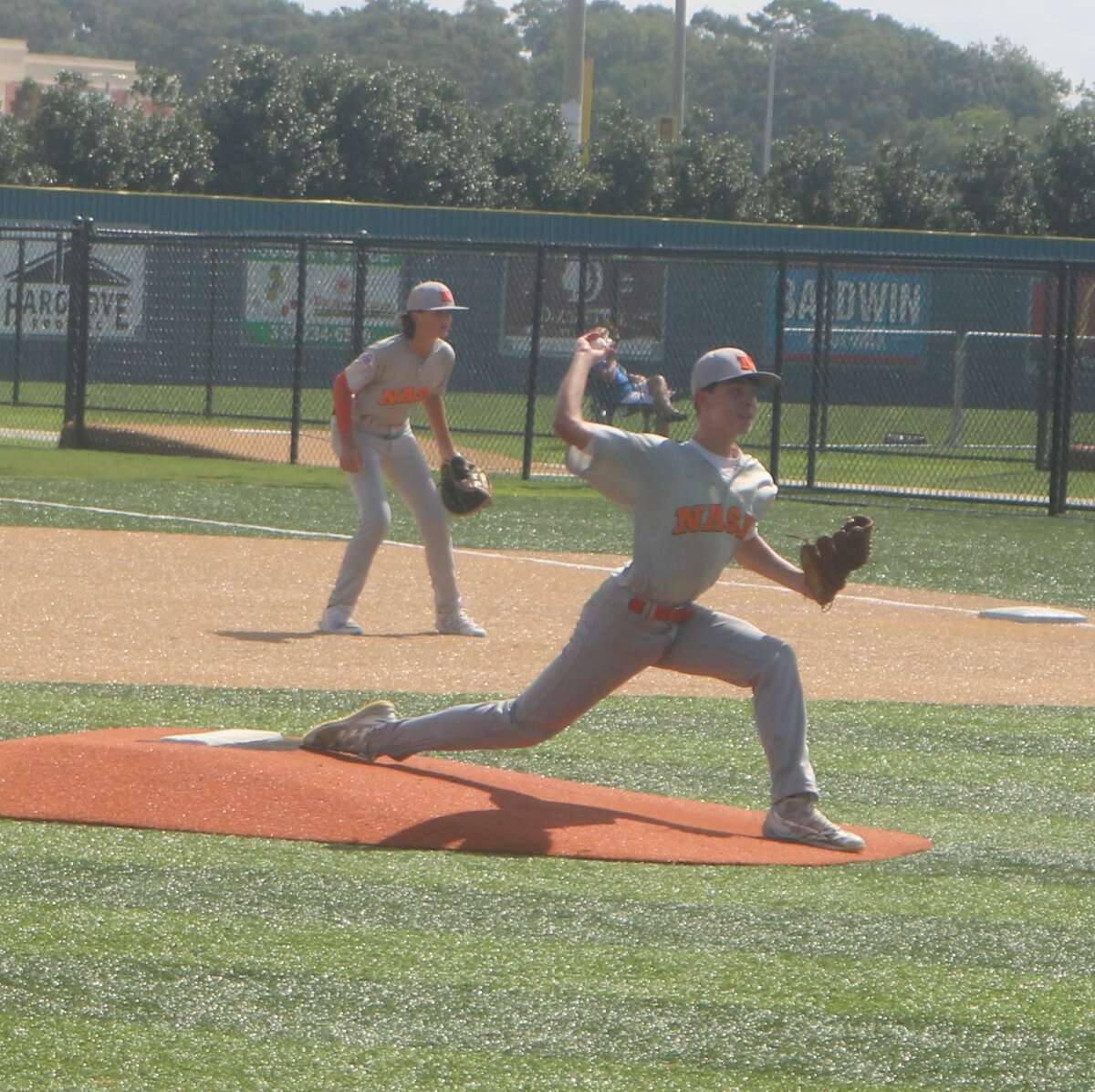NASA pitcher Jared Jochim works on a Palmview Elite batter during Sunday morning's South Zone championship game in Youngsville, La. Jochim pitched well enough to win, but a first-inning single did him in.