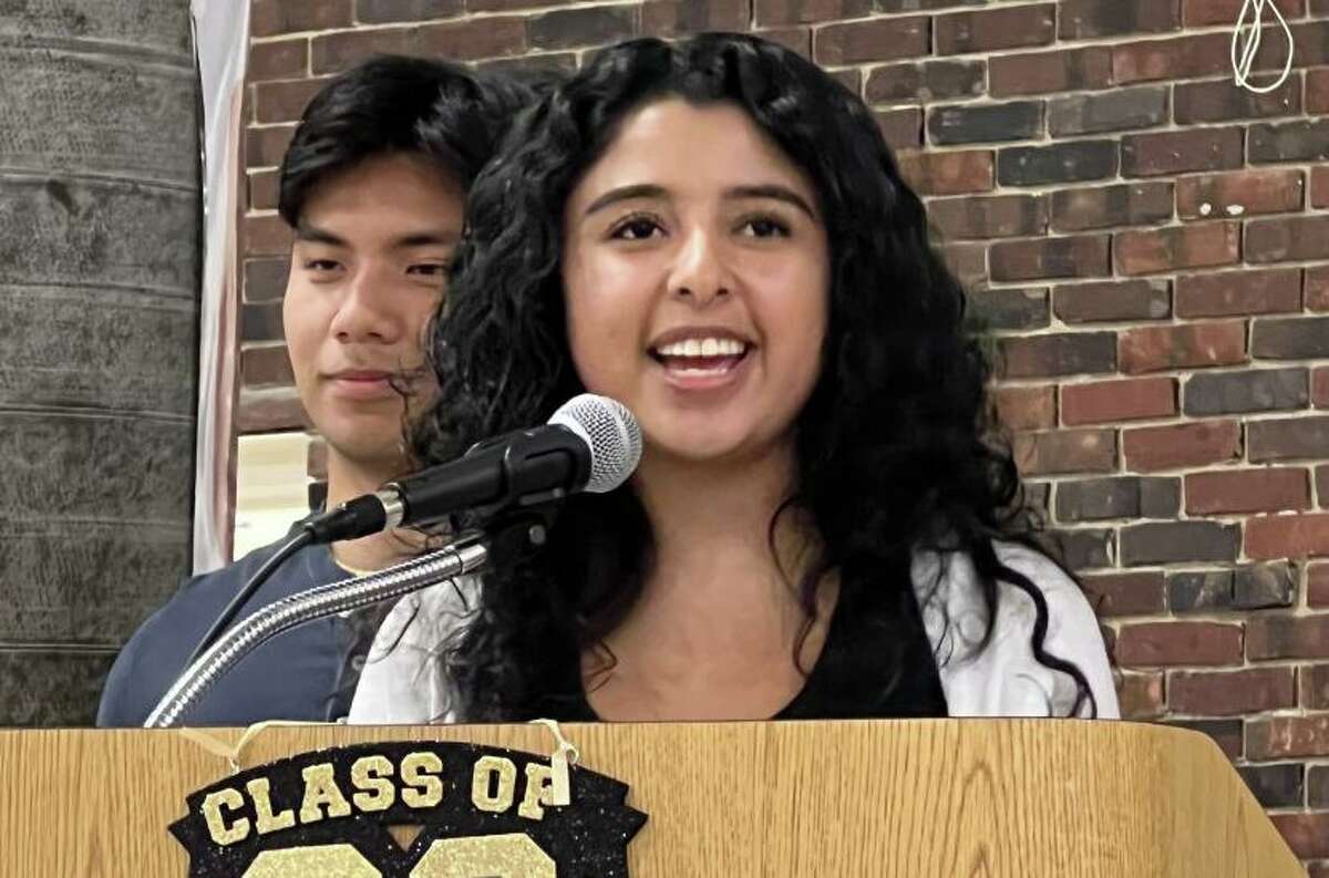 Ashley Sierra, speaking at the AVID graduation at the GHS Student Center, is headed to Fordham. “To know that many of us in AVID wanted to make a difference for our families as first-generation students pushed me to raise the bar and keep standards high,” she said.