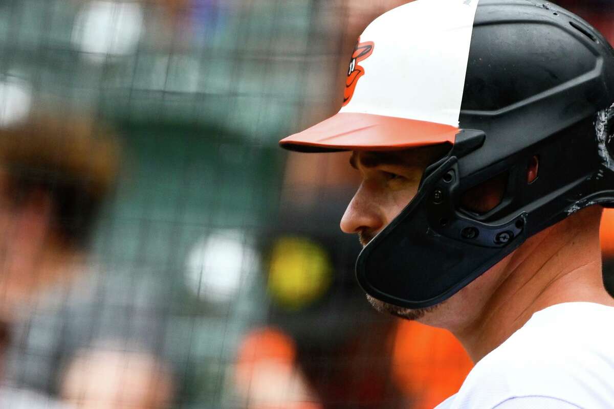 Baltimore Orioles designated hitter Trey Mancini looks on from the on-deck circle during a baseball game against the Tampa Bay Rays, Thursday, July 28, 2022, in Baltimore. (AP Photo/Terrance Williams)
