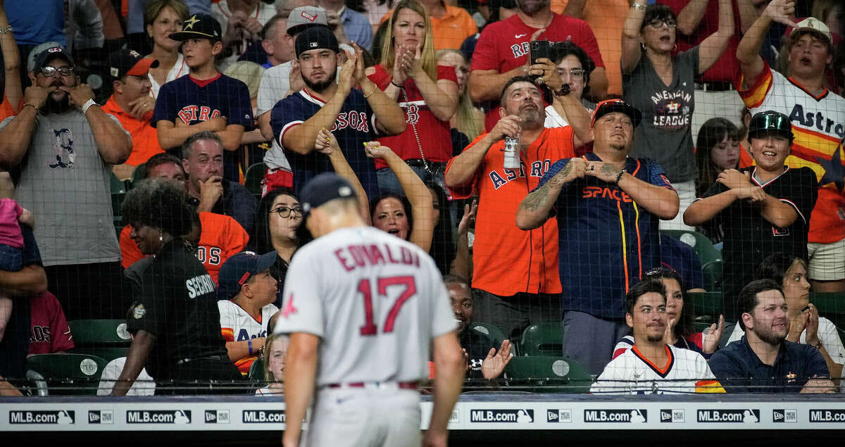 Houston Astros fans cheer as Boston Red Sox starting pitcher Nathan Eovaldi (17) is relieved during the seventh inning of an MLB game Monday, Aug. 1, 2022, at Minute Maid Park in Houston.