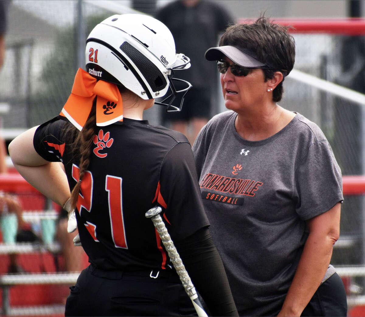 Edwardsville coach Lori Blade (right) talks with Tiger Lexie Griffin during the Class 4A state tournament in June. Blade is the 2022 Telegraph Large-Schools Softball Coach of the Year.
