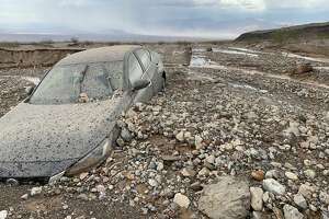 Car swallowed in Death Valley mud