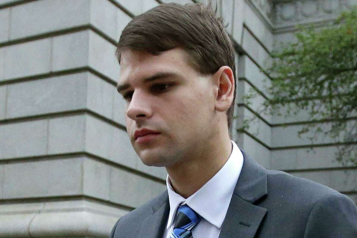In this Aug. 21, 2019, file photo, Nathan Carman departs federal court in Providence, R.I.