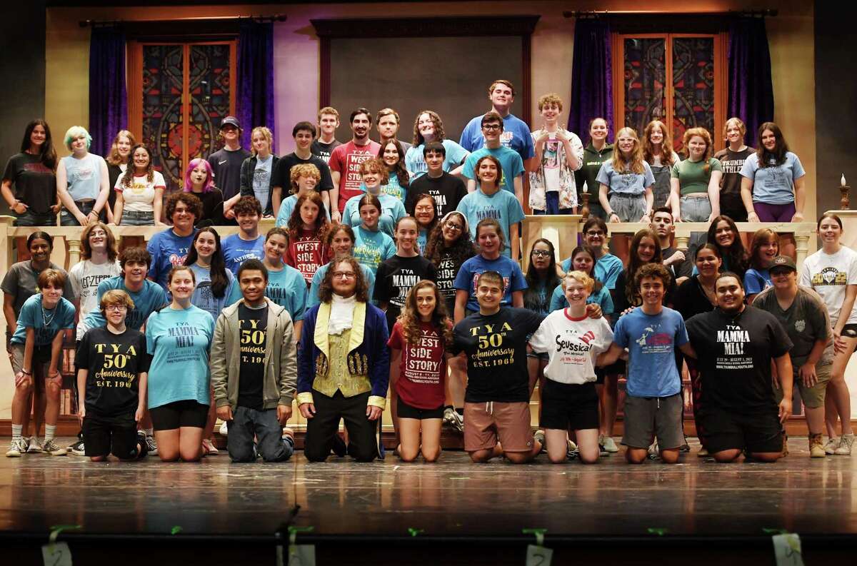 The cast and crew of the Trumbull Youth Association production of Beauty and the Beast at Trumbull High School.