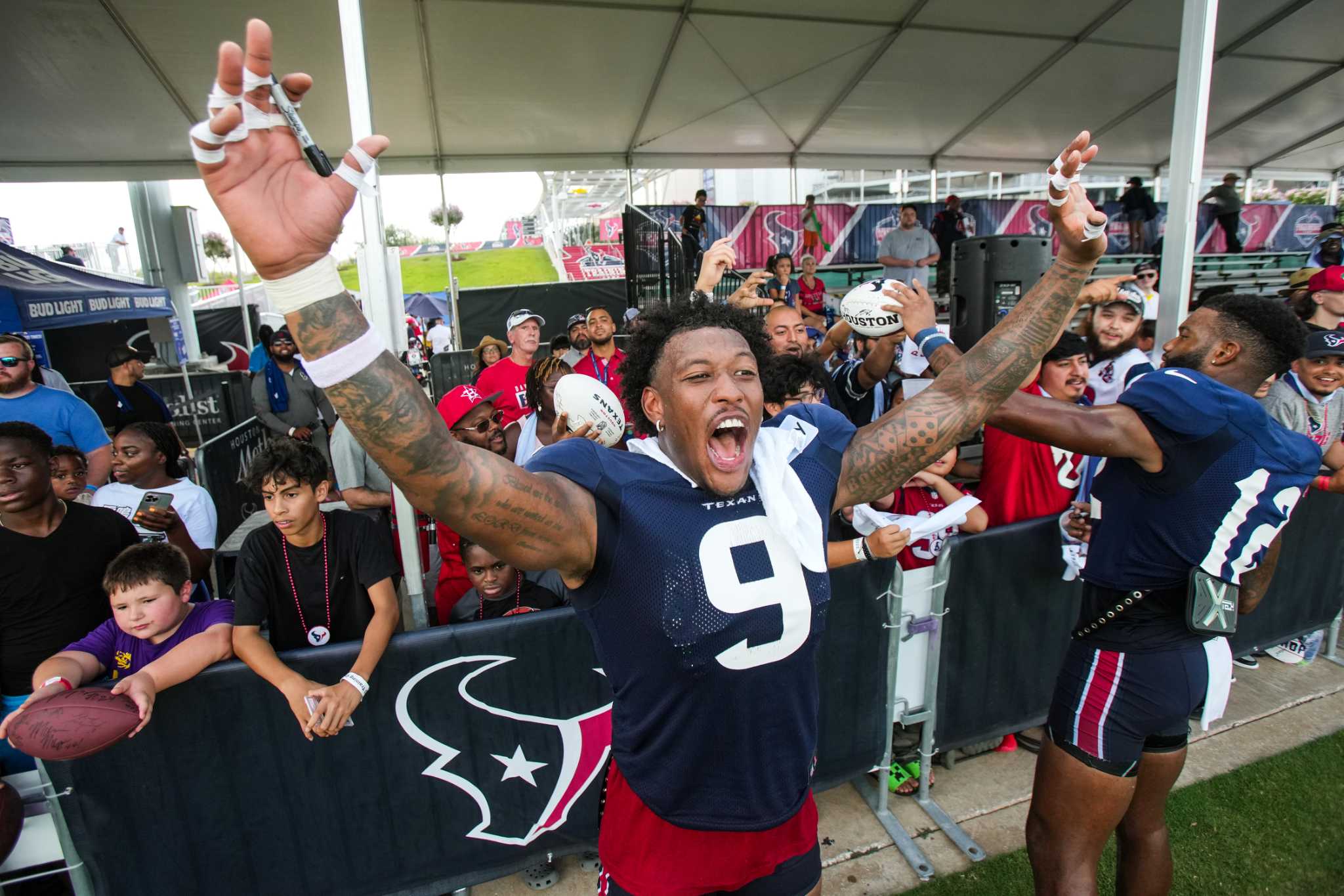 Houston Texans tight end Brevin Jordan (9) warms up before an NFL