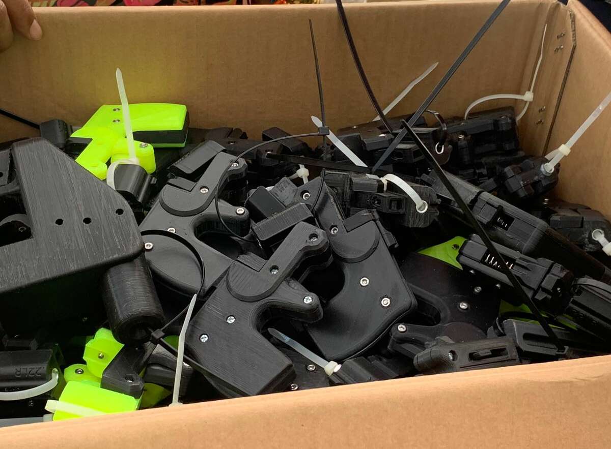 A man who wished to remain unidentified sold a heap of 3D-printed guns to the city during its first gun buyback event on Saturday. 