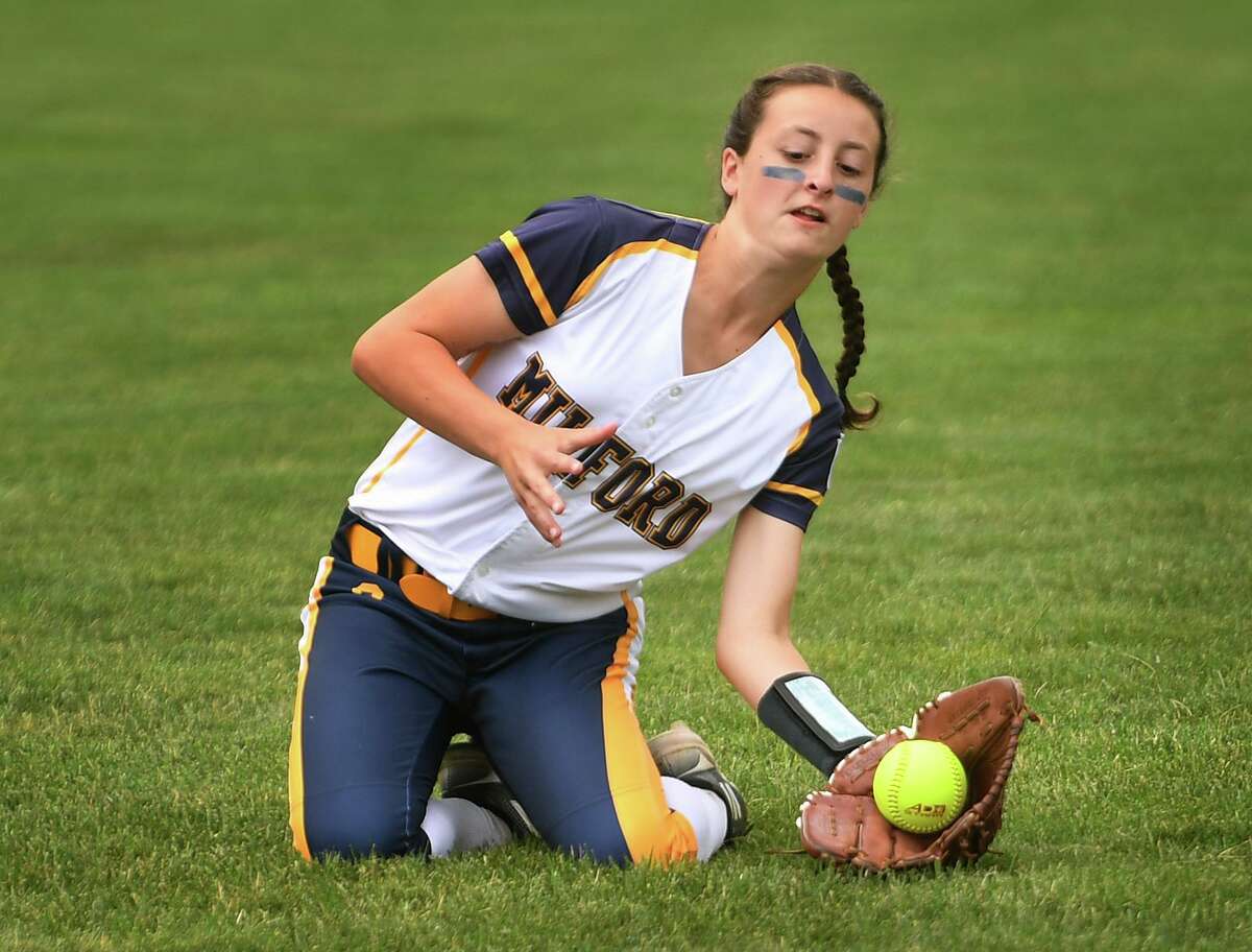 Milford center fielder Maddy Bonanno makes a sliding catch during the second inning of her team’s 10-0 victory over Vermont to win the 2022 Little League Softball East Regional Tournament in Bristol, Conn., on Thursday, July 28, 2022.