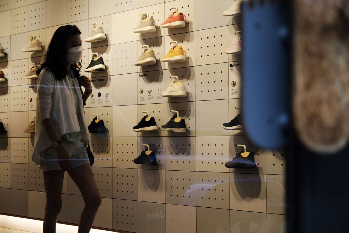 People shop at Allbirds store, a maker of sustainable shoes, in lower Manhattan on August 31, 2021 in New York City.