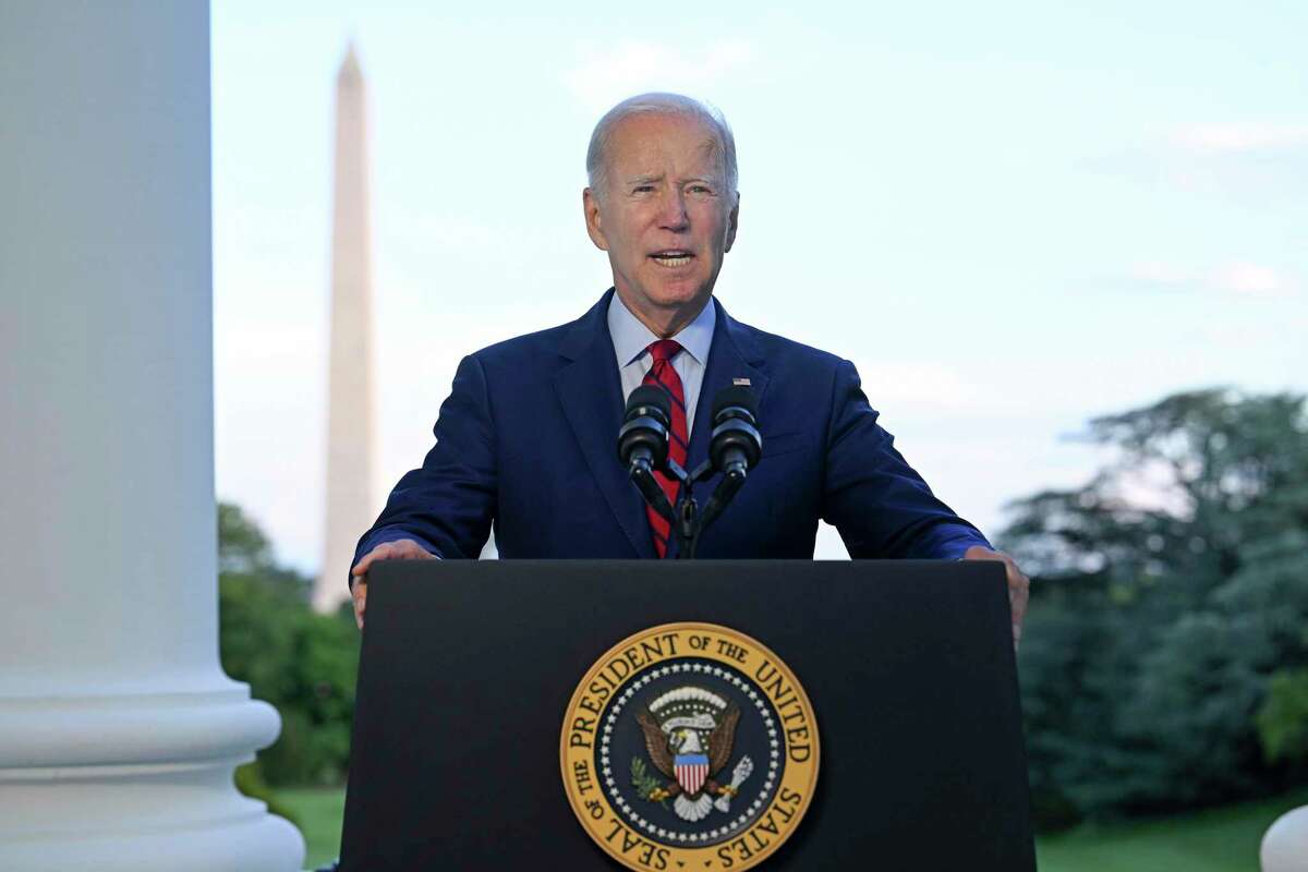 President Joe Biden speaks from the Blue Room Balcony of the White House Monday, Aug. 1, 2022, in Washington. (Jim Watson/Pool via AP)