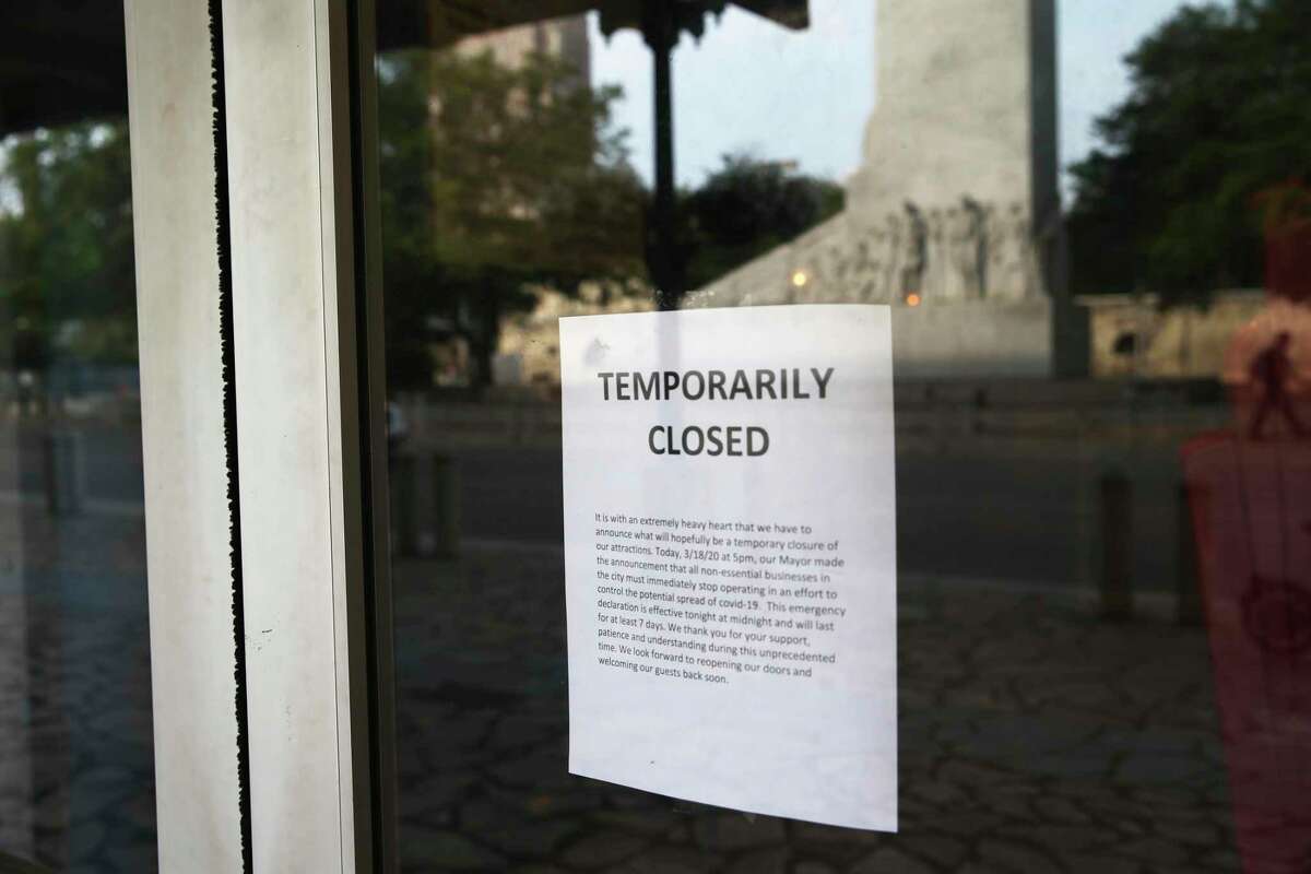 A sign on the door of a business on Alamo Plaza on March 19, 2020, after the city ordered non-essential businesses closed to curb spread of the coronavirus. A new city grant program aims to help businesses that lost lost sales in 2020 and 2021.