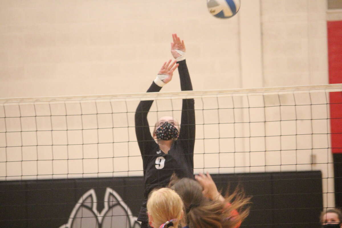 Reed City's Christina Malackanich goes up for the ball during a past volleyball season.