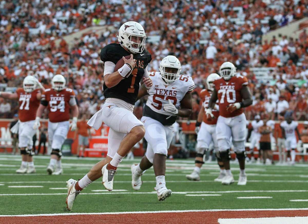 AUSTIN, TEXAS - APRIL 23: Hudson Card #1 of Texas Longhorns rushes for a touchdown during the Orange-White Spring Game at Darrell K Royal-Texas Memorial Stadium on April 23, 2022 in Austin, Texas. (Photo by Tim Warner/Getty Images)